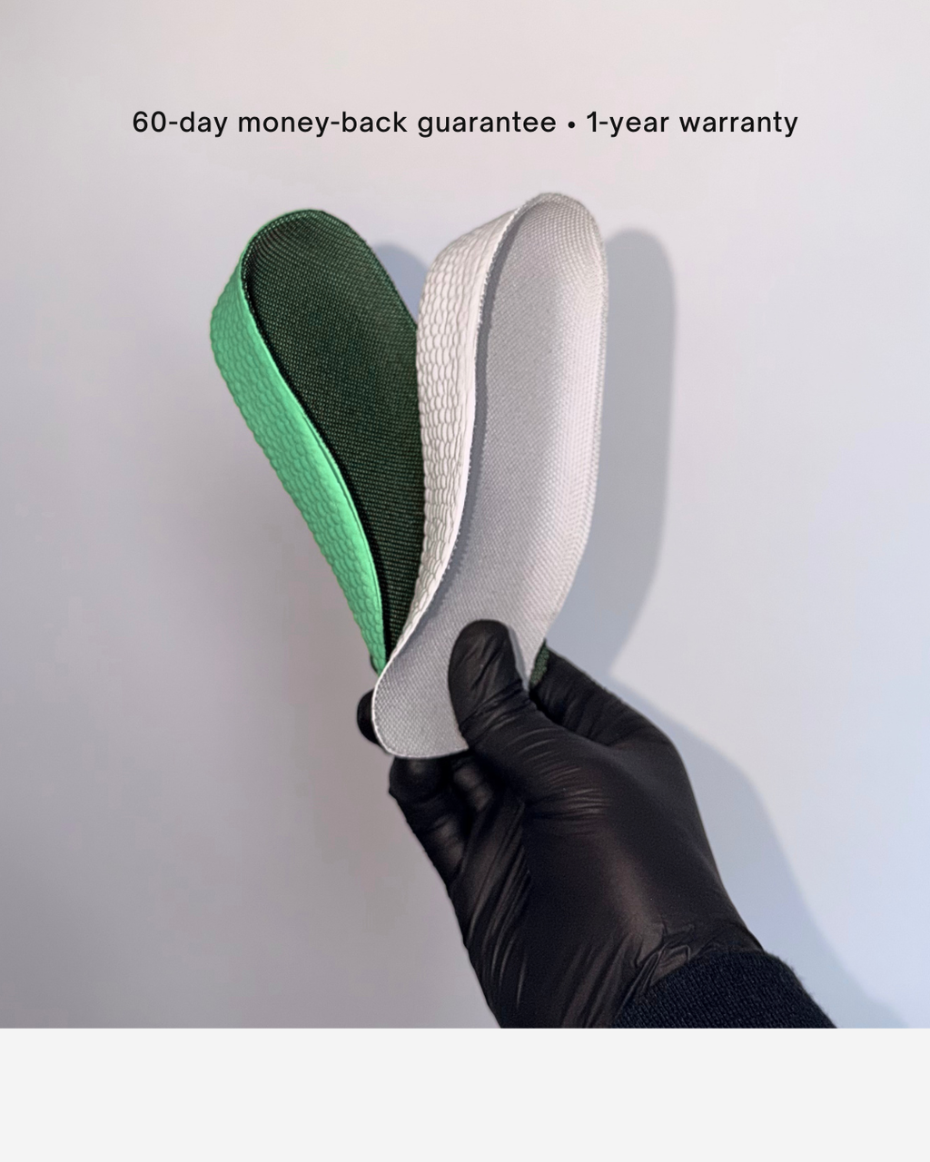 A hand holding a pair of Öndörq Elevate Invisible height Insole for men against a plain beige background, with black text at the top reading '60-day money-back guarantee • 1-year warranty'.