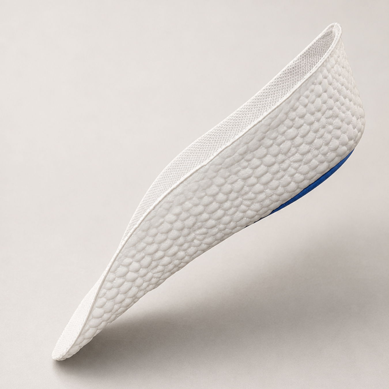 White ONDORQ Elevate - Height Increasing Insoles on dark background