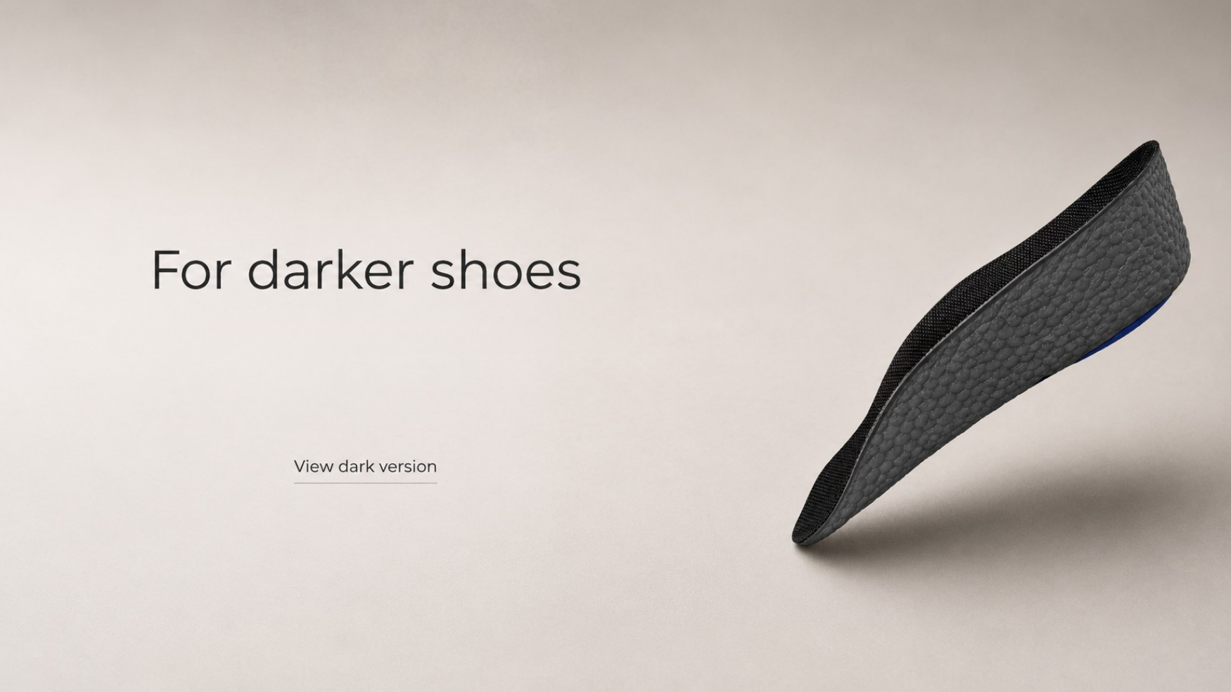 Black Ondorq Elevate height boosting insoles on dark grey background with text saying "view dark version"