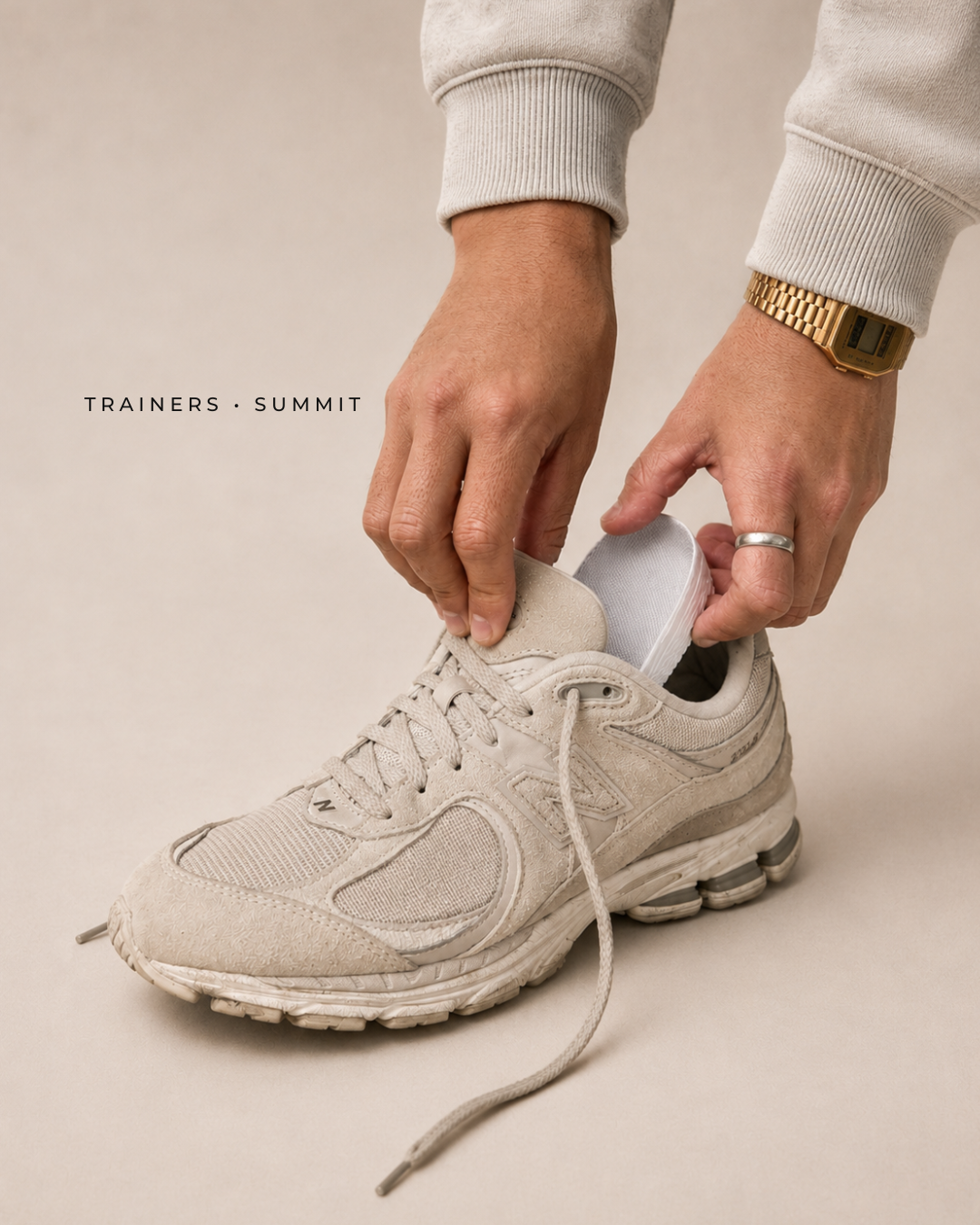 ÖNDÖRQ Elevate Summit insoles being inserted into light trainers