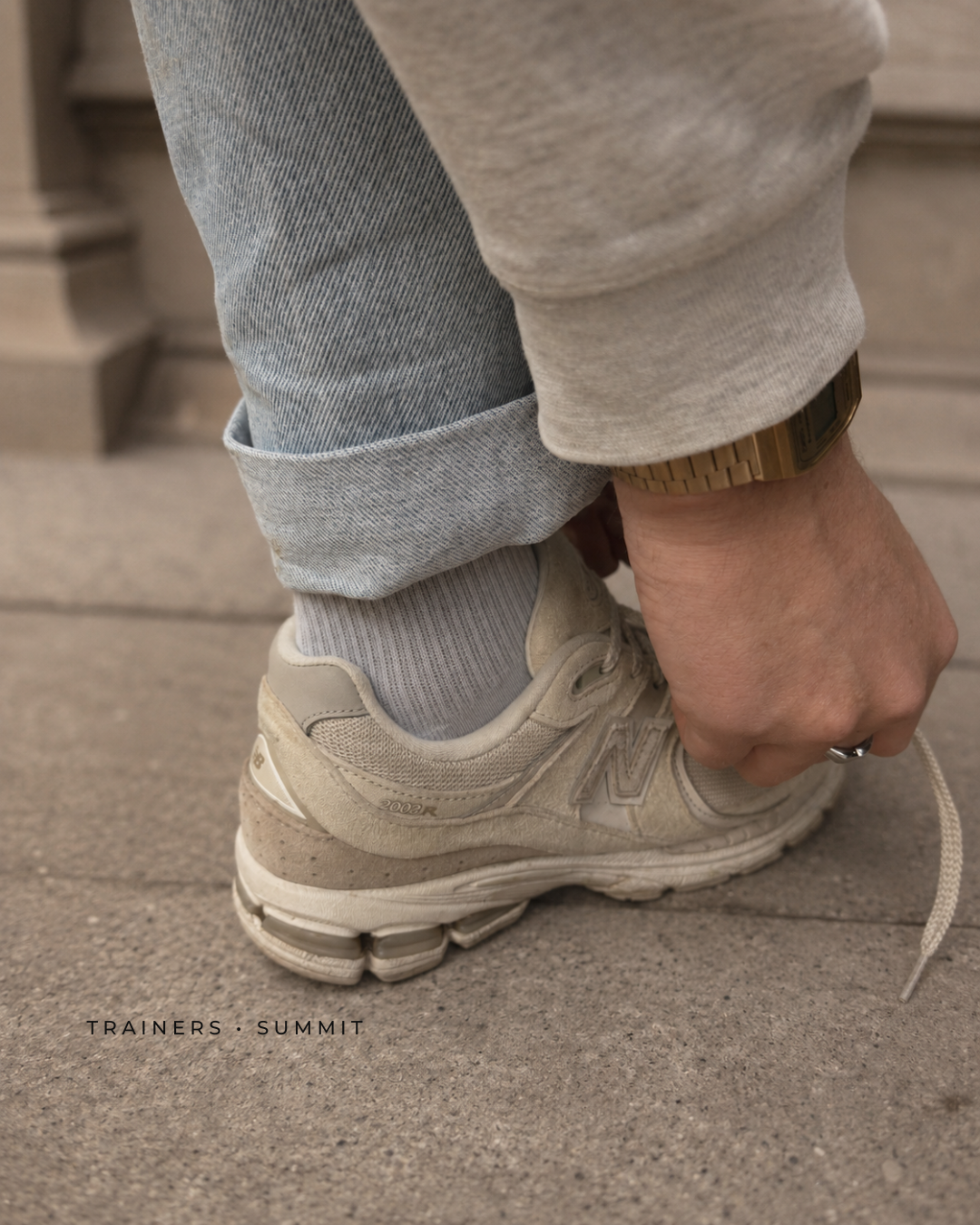 Man wearing white trainers with ÖNDÖRQ Elevate Summit insoles