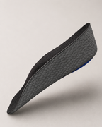 Single black ÖNDÖRQ Elevate height increase insole floating on neutral background